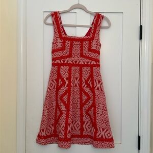 Maeve adorable red sundress purchased from Anthropologie